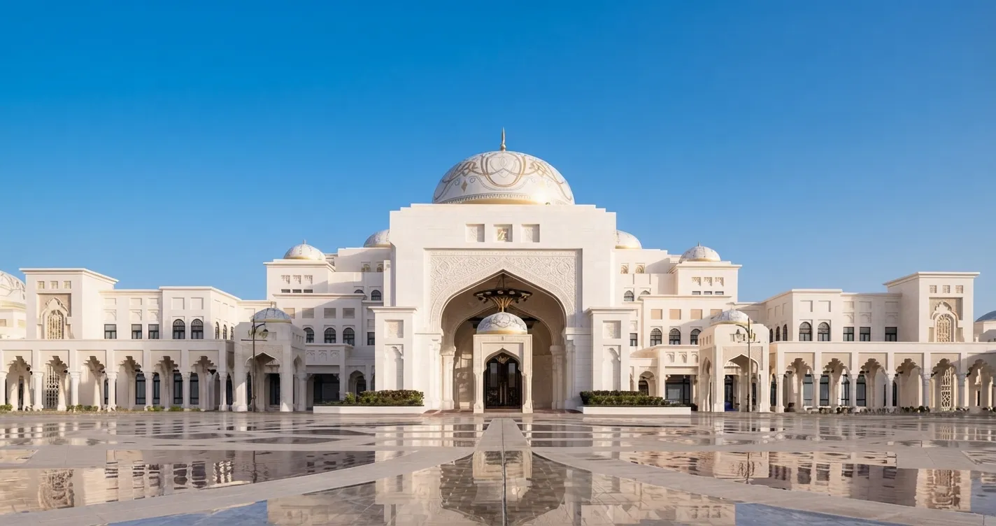 The white façade of Qasr Al Watan, the presidential palace in Abu Dhabi, its central dome reflected in the polished forecourt
